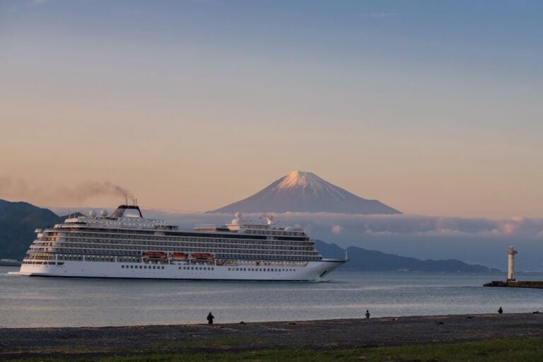 Luxury tourist cruise ship sailing on Shimizu bay and mount Fuji around.