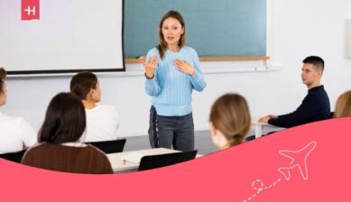 professor and students in classroom - insurance plans for international students