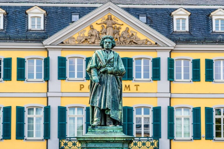 A large outdoor bronze statue of Ludwig van Beethoven.
