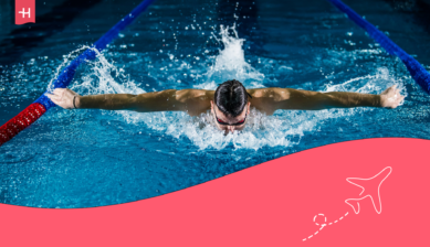 An athletic swimmer competing in a race.