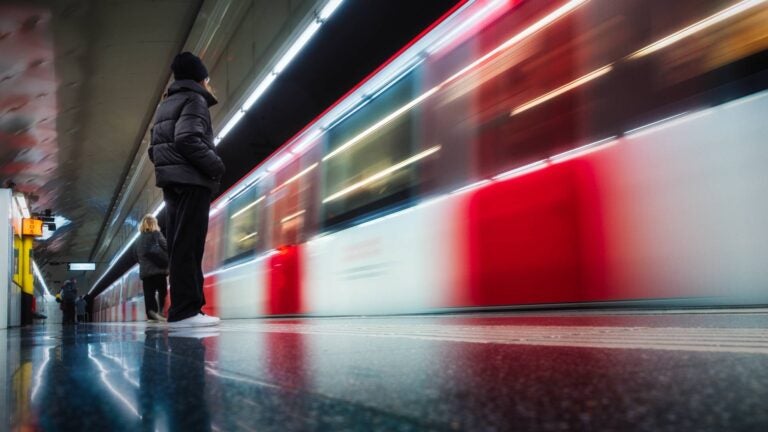 People waiting for the barcelona metro during winter