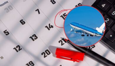 Calendar with a date circled in red marker beside a calculator, with an airplane taking off shown in a circular inset