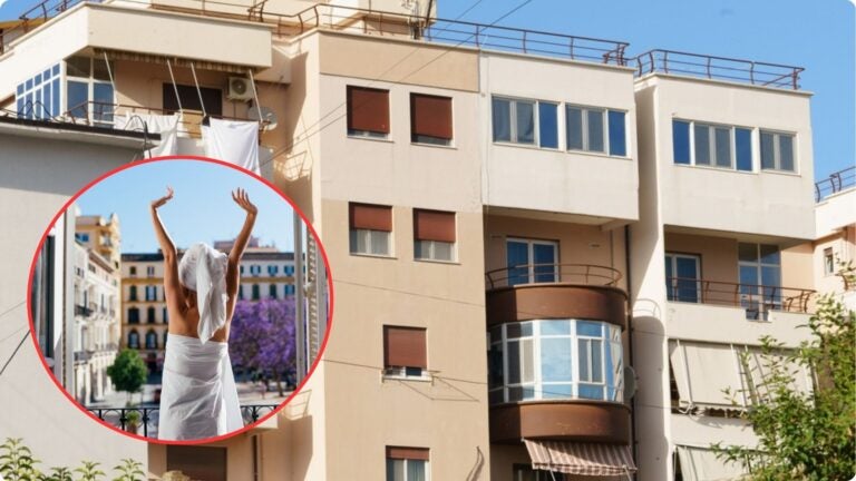 A residential apartment building in Spain with balconies, windows, and air-conditioning units, illustrating typical housing in Spanish cities.