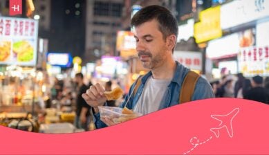 Travler buying street food in China