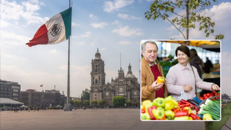 A retired couple shopping at a market beside Mexico City’s Zócalo and cathedral.