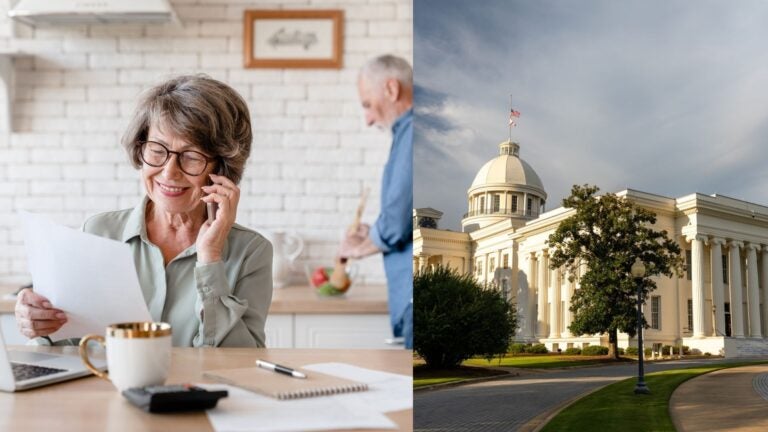 A retiree on the phone beside the Alabama State Capitol in Montgomery.