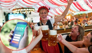 People in traditional Bavarian dress raising beer steins for a toast inside a red-and-white striped Oktoberfest tent, with a circular inset showing a hand holding a smartphone open to a "Book Your Travel" booking app.