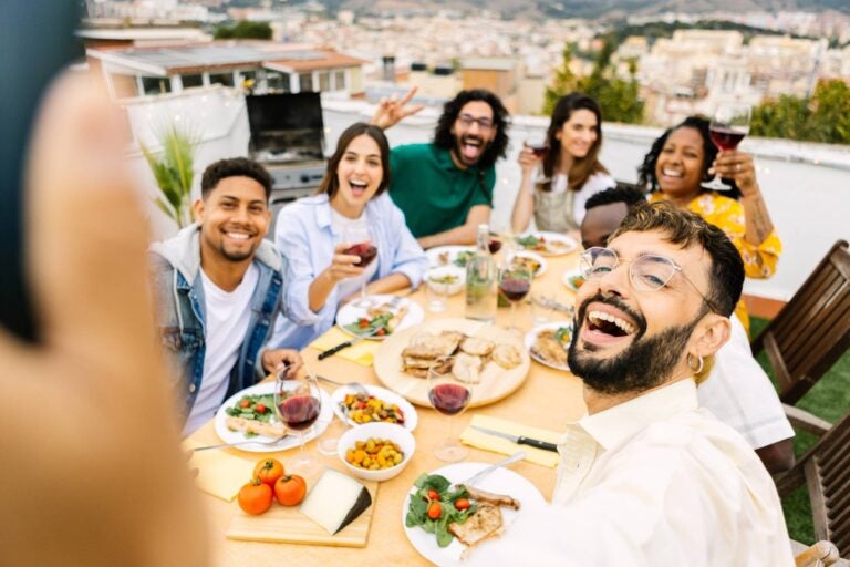 Group of people enjoying a traditional food from Barcelona