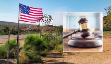 An American flag and a Route 66 flag flying beside a desert highway, with an inset image of a wooden judge's gavel.