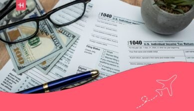 tax forms, cash, pen and spectacles on a table - States that don’t tax Social Security