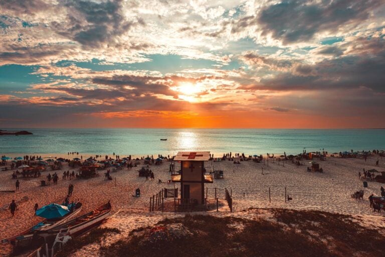 a beach on arrial do cabo during the sunset