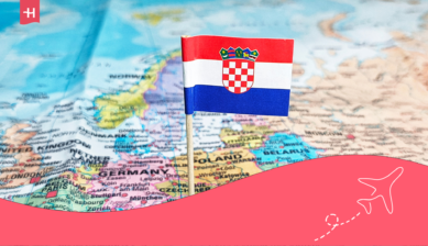 Croatian flag pinned to a map of Europe