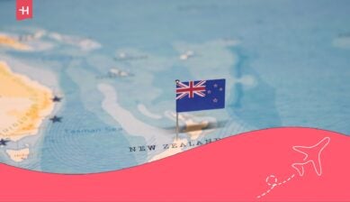 New Zealand flag pin on a map