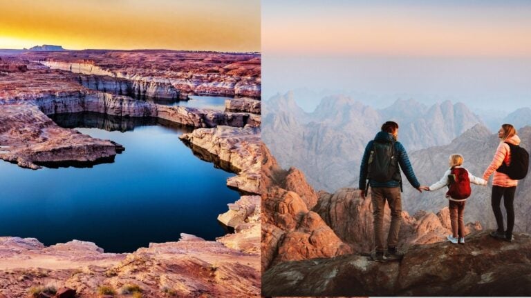 Rocky shoreline and blue water at Lake Powell beside a family hiking in the mountains