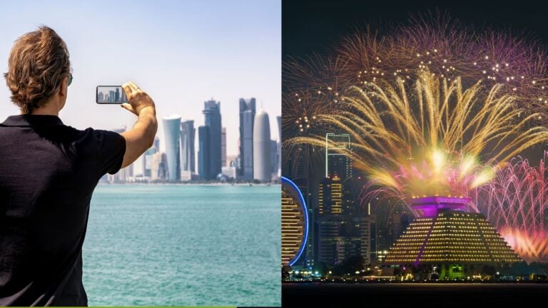 Doha skyline photographed during the day and illuminated by fireworks at night.