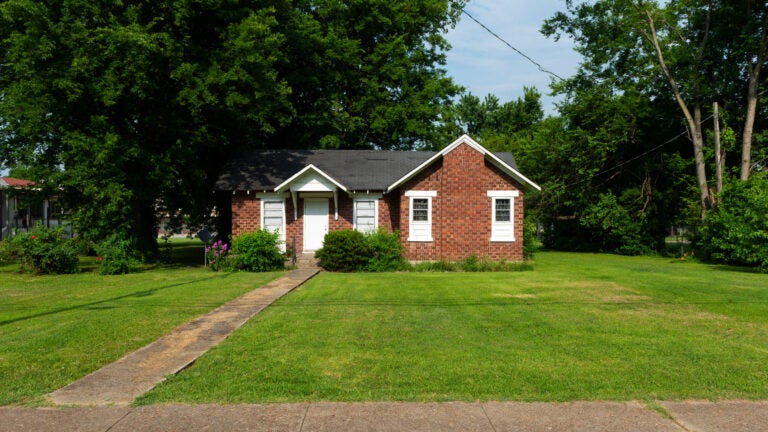 A single-family home on a quiet residential street in Rosedale, Mississippi