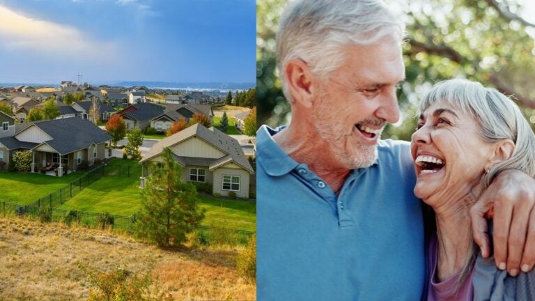 Residential neighborhood in Spokane alongside a smiling retired couple outdoors.