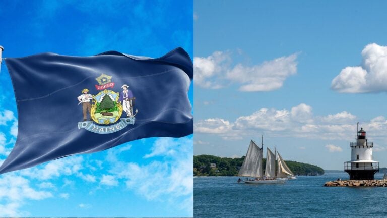 Maine state flag alongside a schooner sailing past a white lighthouse.