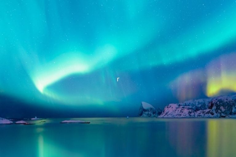 Northern lights or Aurora borealis in the sky.