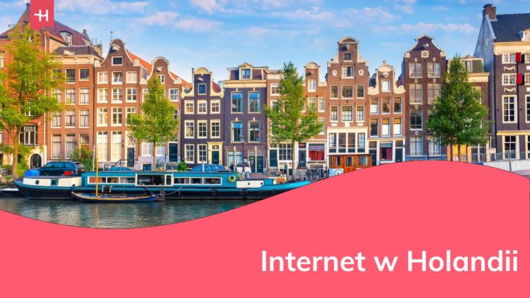 Widok na kolorwe domki w Amsterdamie.