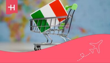 Einkaufswagen in einem Supermarkt mit italienischer Flagge