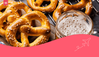 Brezeln und Maßkrug Bier