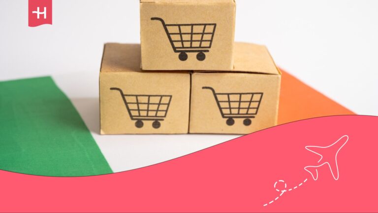 Cajas con un logo de un carrito de la compra sobre una bandera irlandesa.