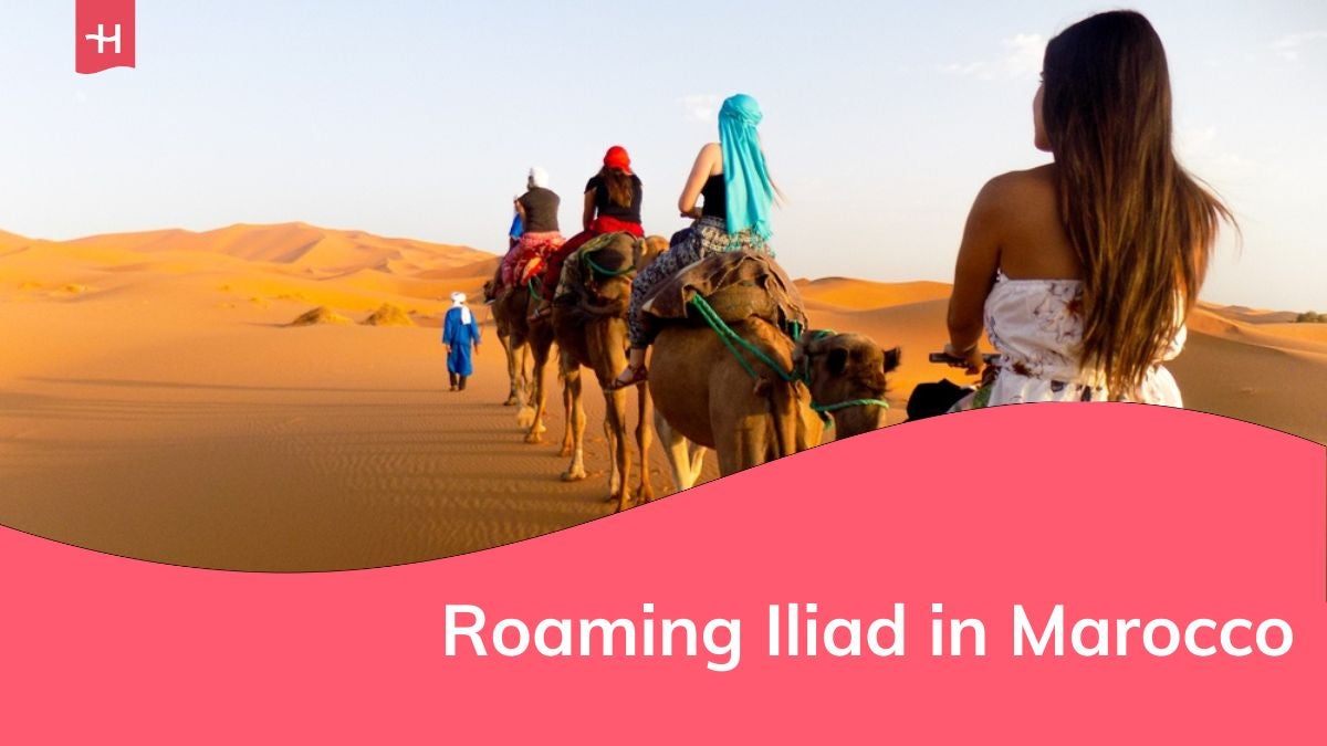 Modella colombiana in viaggio attraverso il Marocco a dorso di cammello