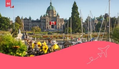 Victoria Inner Harbour vista con British Columbia Parlamento e fiori - Victoria, British Columbia, Canada