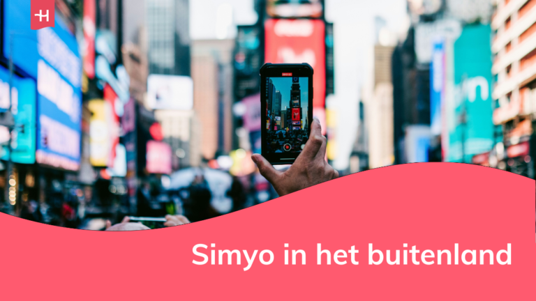 Foto van een persoon die een filmpje maakt met zijn smartphone op Times Square als uitgelichte afbeelding voor een pagina over Simyo in het buitenland