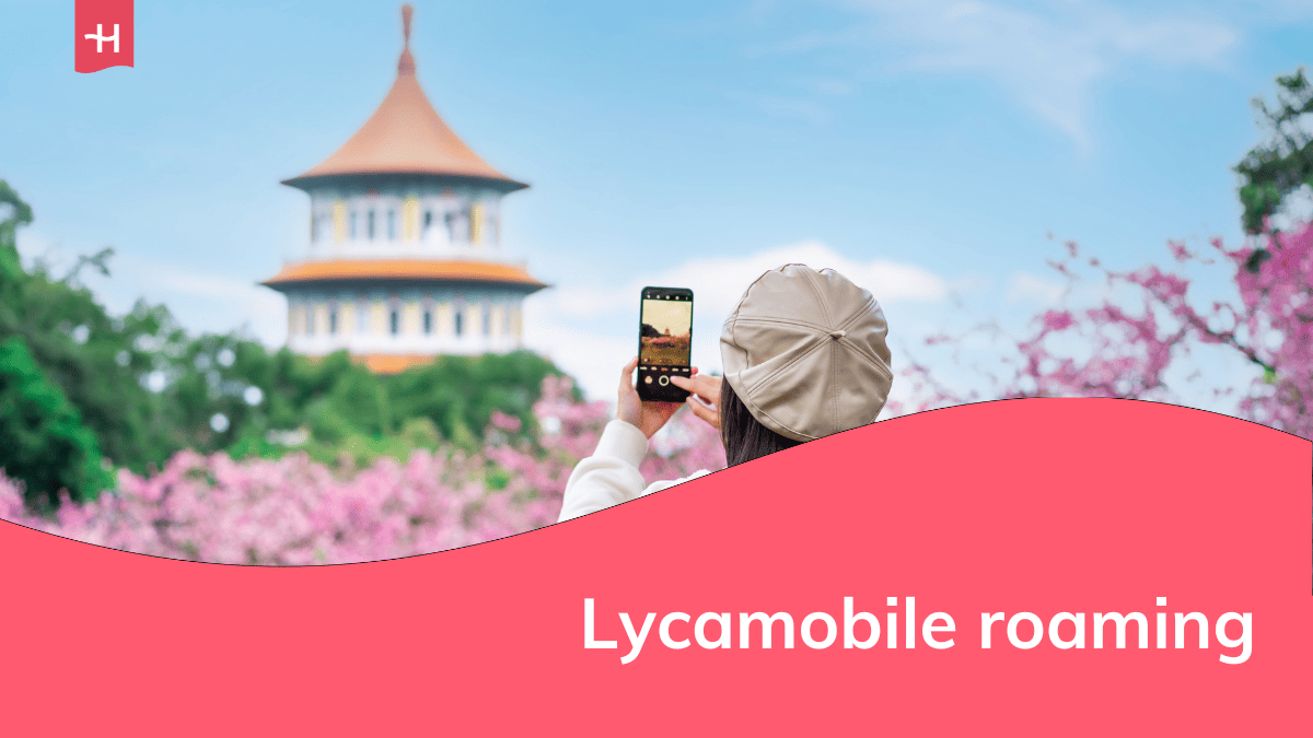 Foto van een vrouw die een foto neemt van een tempel in Taiwan als uitgelichte afbeelding voor een artikel over Lycamobile roaming