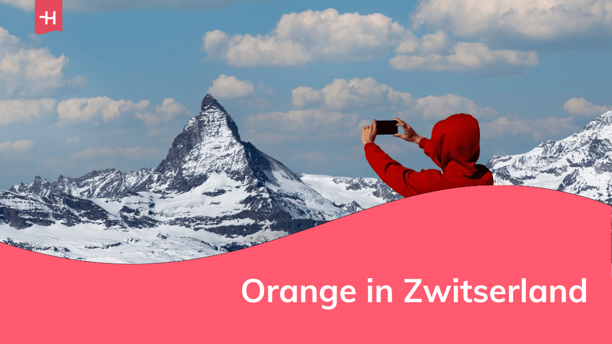 Foto van een man die een foto neemt van de Matterhorn als uitgelichte afbeelding voor een artikel over Orange in Zwitserland
