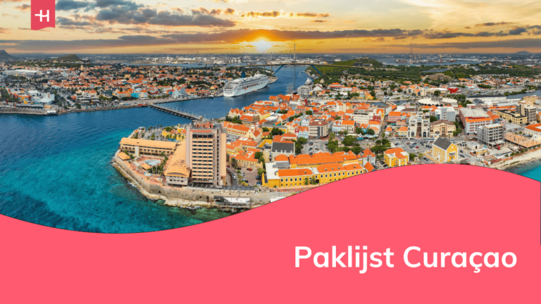 Luchtfoto van Willemstad als uitgelichte afbeelding voor een artikel over paklijst Curaçao