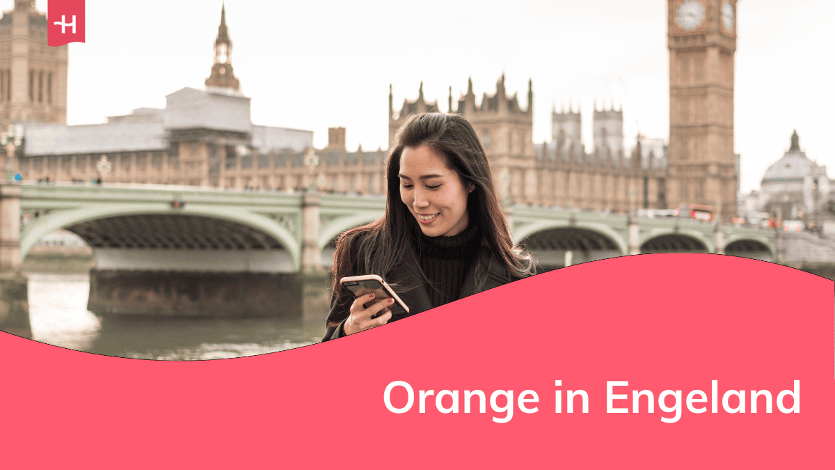Foto van een vrouw die naar haar smartphone kijkt met op de achtergrond de Houses of Parliament en de Big Ben als uitgelichte afbeelding voor een artikel over roaming in Engeland met Orange