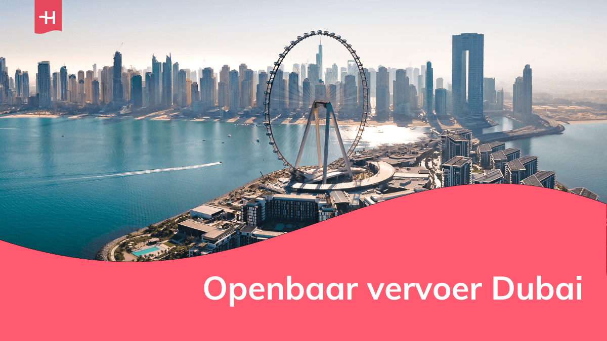 Foto van het reuzenrad met de skyline van Dubai op de achtergrond voor een artikel over het openbaar vervoer in Dubai