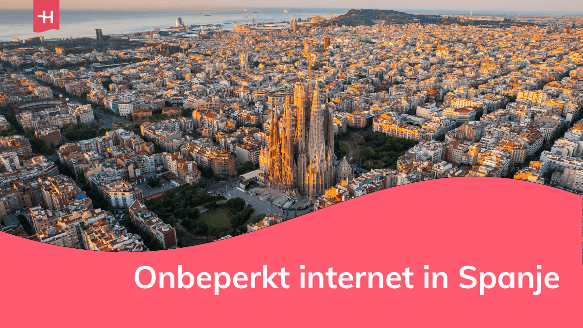 Luchtfoto van Barcelona met de Sagrada Familia op de voorgrond als uitgelichte afbeelding voor een artikel over onbeperkt internet in Spanje