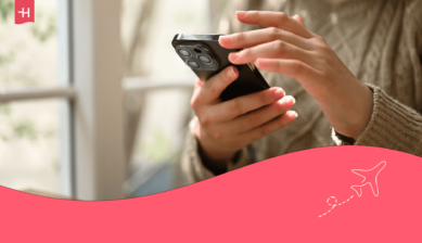 Foto van een persoon met een smartphone in de hand als uitgelichte afbeelding voor een artikel over het gebruik van Telegram zonder telefoonnummer