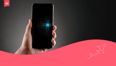 يد تحمل هاتفاً محمولاً تظهر عليه كلمة "eSIM"؛ صورة بارزة لمقال حول عنوان SM-DP+ وكيفية استخدامه.