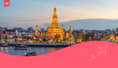 Elveutsikt fra en bar i Bangkok med utsikt mot det thailandske tempelet «Wat Arun» – som utvalgt bilde for en artikkel om internett i utlandet.